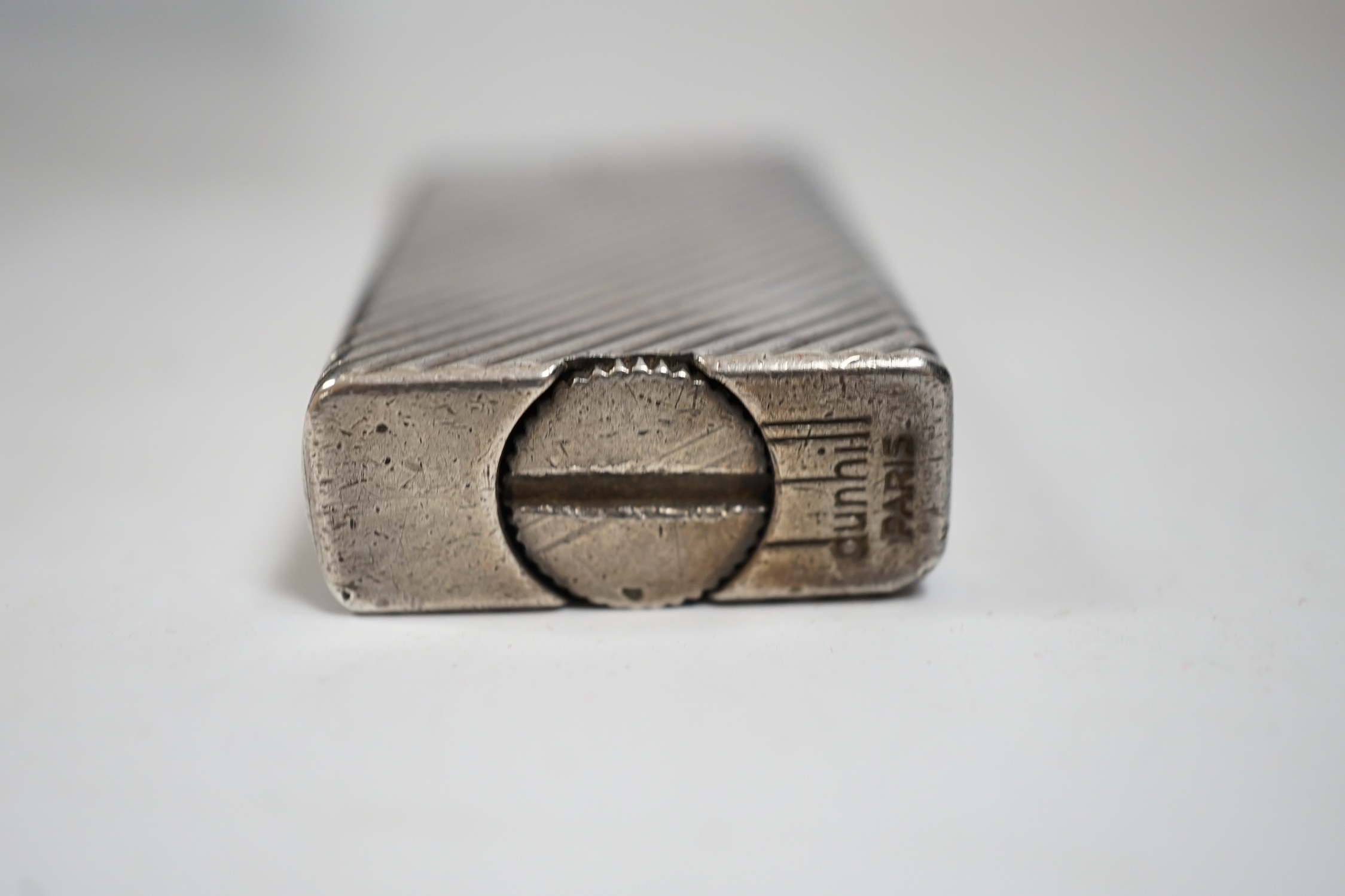 A Dunhill Rollagas lighter, 5.5cm high. Condition - fair, not working